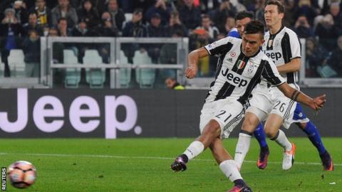 Paulo Dybala scores a penalty for Juventus