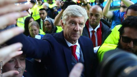 Arsene Wenger greets fans following his last game in charge of Arsenal in May 2018