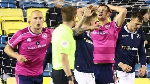 QPR striker Matt Smith rues a missed opportunity at The Den