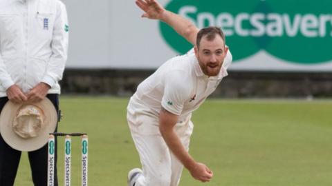 Ben Raine bowling for Durham