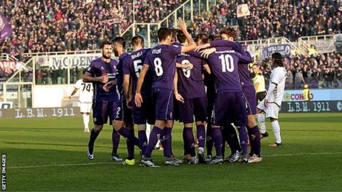 Fiorentina's players celebrate scoring against Udinese