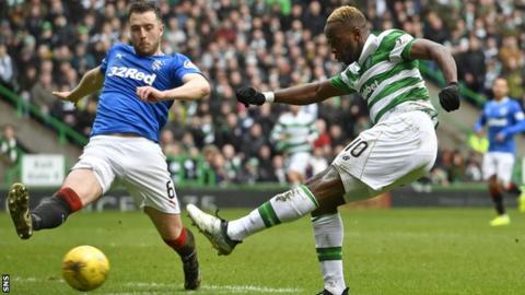 Danny Wilson tries to block Moussa Dembele
