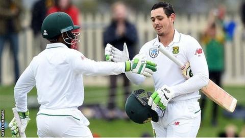 Temba Bavuma congratulates Quinton de Kock on his century