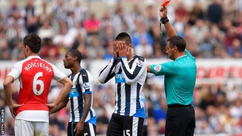 Aleksandar Mitrovic is dismissed by Andre Marriner in the defeat by Arsenal