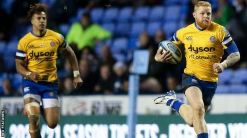 Bath's Tom Homer races clear for a second-half try with Bath and England wing Anthony Watson in support
