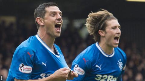 Graham Dorrans and Josh Windass celebrate a Rangers goal