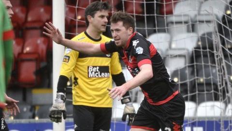 Delight for Billy Joe Burns after he puts Crusaders 2-1 in front against Glentoran at Seaview