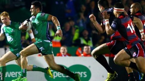 Connacht's Tiernan O'Halloran sprints clear to score a try against Edinburgh
