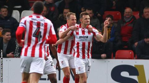 Will Boyle celebrates opening the scoring for Cheltenham Town