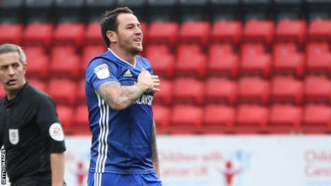 Lee Tomlin celebrates