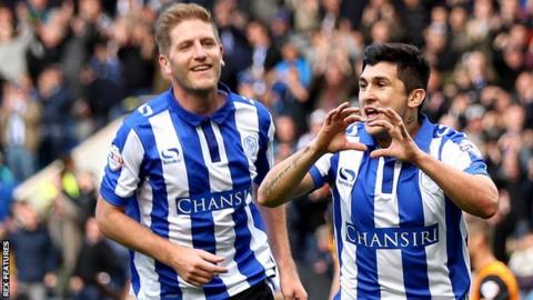 Fernando Forestieri (right) celebrates his first-half goal against Hull City