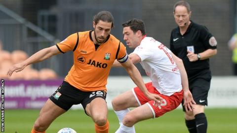 Barnet's Dan Sweeney moves away from Newport's Ben Tozer