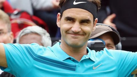 Roger Federer celebrates beating Mischa Zverev at the Stuttgart Open