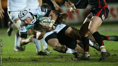 Hanno Dirksen of Ospreys takes on Angus O’Brien of Newport Gwent Dragons