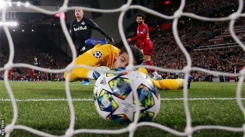 Liverpool's Mohamed Salah scores against Red Bull Salzburg