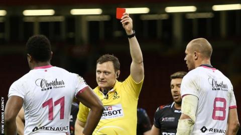 Referee Matthew Carley shows Josaia Raisuqe a red card