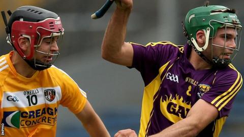Antrim's Maol Connolly in action against Conor Devitt of Wexford