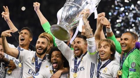 Real Madrid lift the Champions League trophy