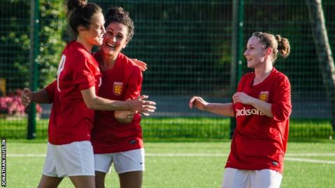 Eve Watson celebrates one of her four goals