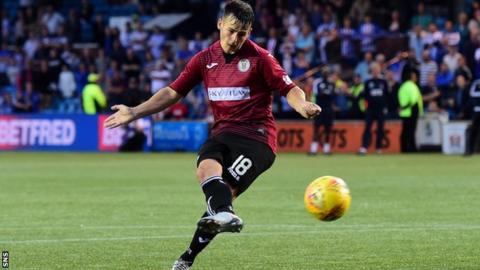 Danny Mullen scores the winning penalty for St Mirren