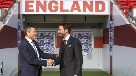 Martin Glenn shakes hands with Gareth Southgate