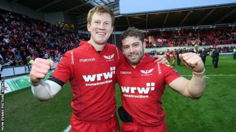 Rhys Patchell and Leigh Halfpenny celebrate victory against La Rochelle in the Champions Cup quarter-final