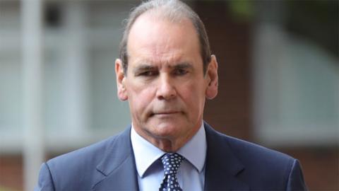 Sir Norman Bettison arrives at Preston Crown Court