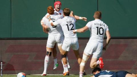 England players celebrate Phil Burgess' late try against USA