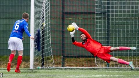 East Kilbride's Matt McGinley saves from Kyle Miller