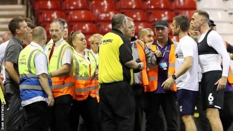 An altercation at the end of Forest v Derby in the EFL Cup