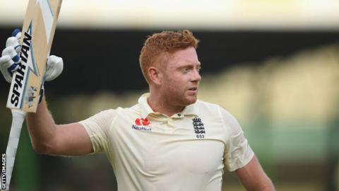England batsman Jonny Bairstow raises his bat to salute the crowd after hitting a century on day one of the third Test against Sri Lanka