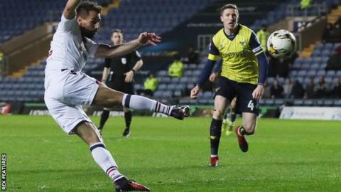 Filipe Morais scores Bolton's opening goal against Oxford United