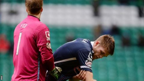 Ross County goalkeeper Scott Fox consoles Marcus Fraser