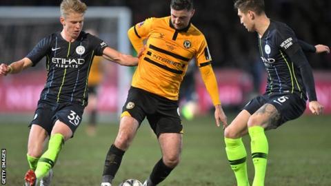 Padraig Amond in action against Manchester City