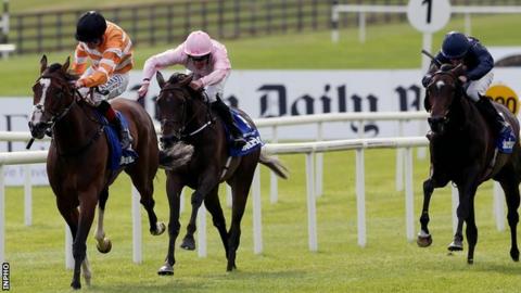 Covert Love wins The Irish Oaks by a length and three-quarters at The Curragh