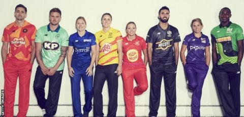 Players line up in the kits