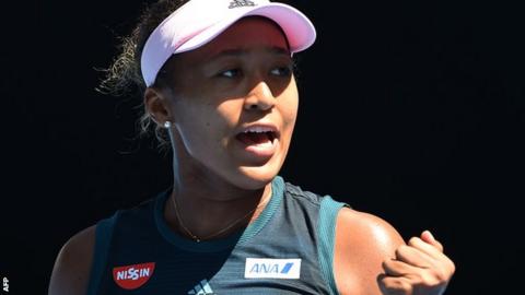 Naomi Osaka celebrates winning a point against Elina Svitolina