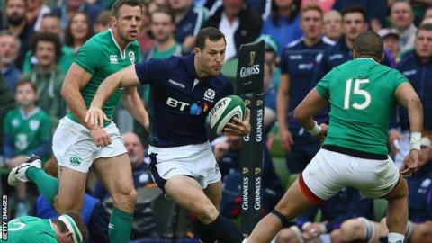 Scotland's Tim Visser bursts between Gordon D'Arcy and Simon Zebo