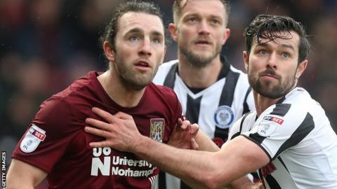 John-Joe O'Toole (left) jostles with a Rochdale player