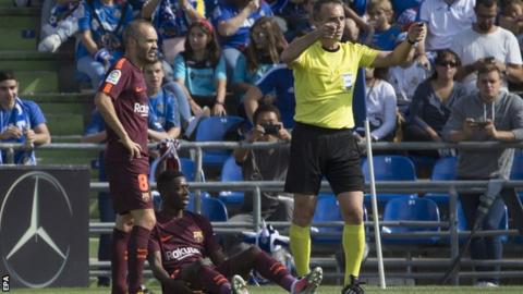 Barcelona forward Ousmane Dembele (centre)