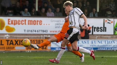 Scott McDonald scores