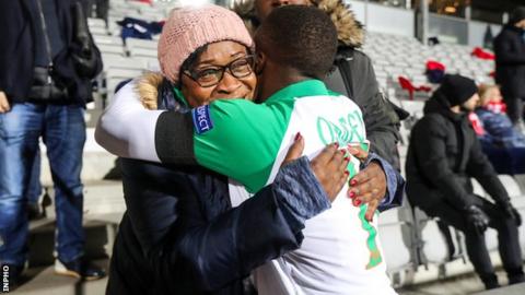 Michael Obafemi and his mother Bola