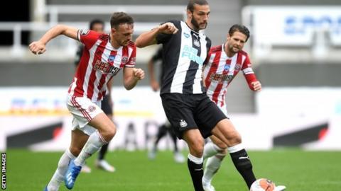 Andy Carroll playing for Newcastle against Sheffield United