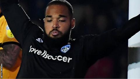 Zeus de la Paz makes a save for Oldham