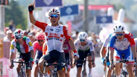 Caleb Ewan celebrates after winning stage