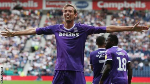 Stoke City striker Peter Crouch celebrates his goal against Preston