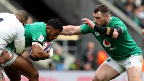 Cian Healy ready to move in after Bundee Aki is tackled in Sunday's defeat by England