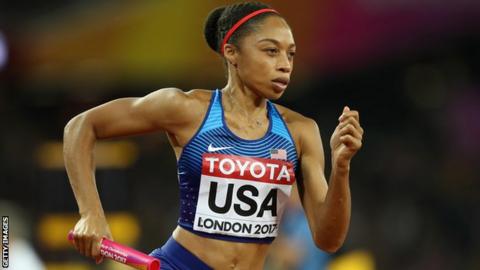 American sprinter Allyson Felix runs with a baton in the 4x400m relay final at the 2017 World Championships in London