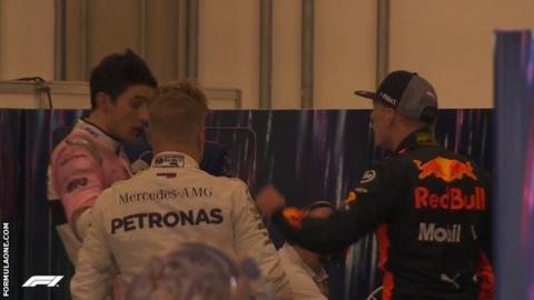 Max Verstappen pushes Esteban Ocon in the weigh-in room at Interlagos