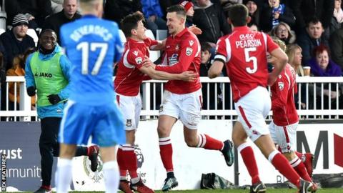 Wrexham's Scott Quigley celebrates opening the scoring in his side's win at Hartlepool